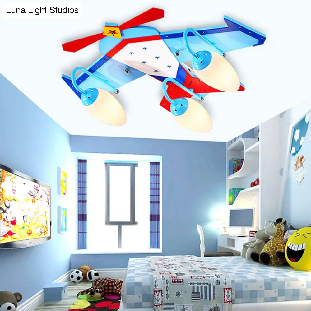 Lámpara de techo empotrada en color azul para niños con pantalla de cristal color crema ovalada, lámpara de techo empotrada en forma de plano de madera con acabado de madera