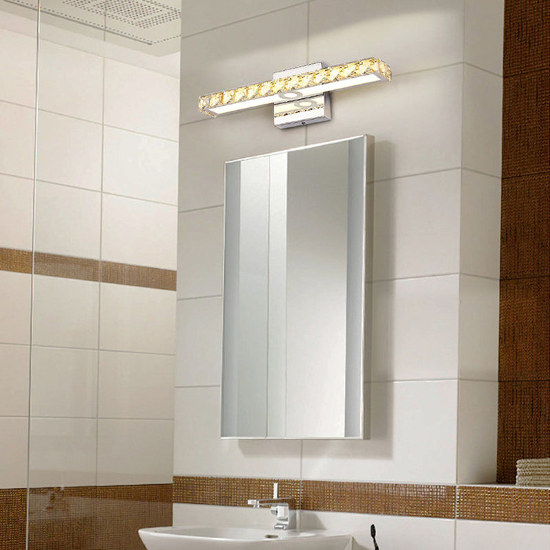 Lámpara de tocador de cristal moderna: aplique de pared lineal plateado/champán con 1 luz en blanco cálido/blanco para baño