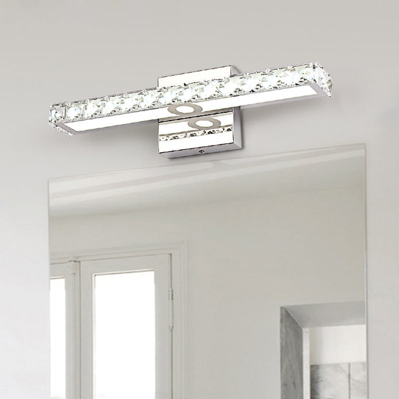 Lámpara de tocador de cristal moderna: aplique de pared lineal plateado/champán con 1 luz en blanco cálido/blanco para baño