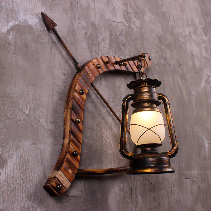 Vintage Lantern Wall Lamp: 1-Light Opal Glass Sconce in Bronze with Wood Bow and Arrow Deco