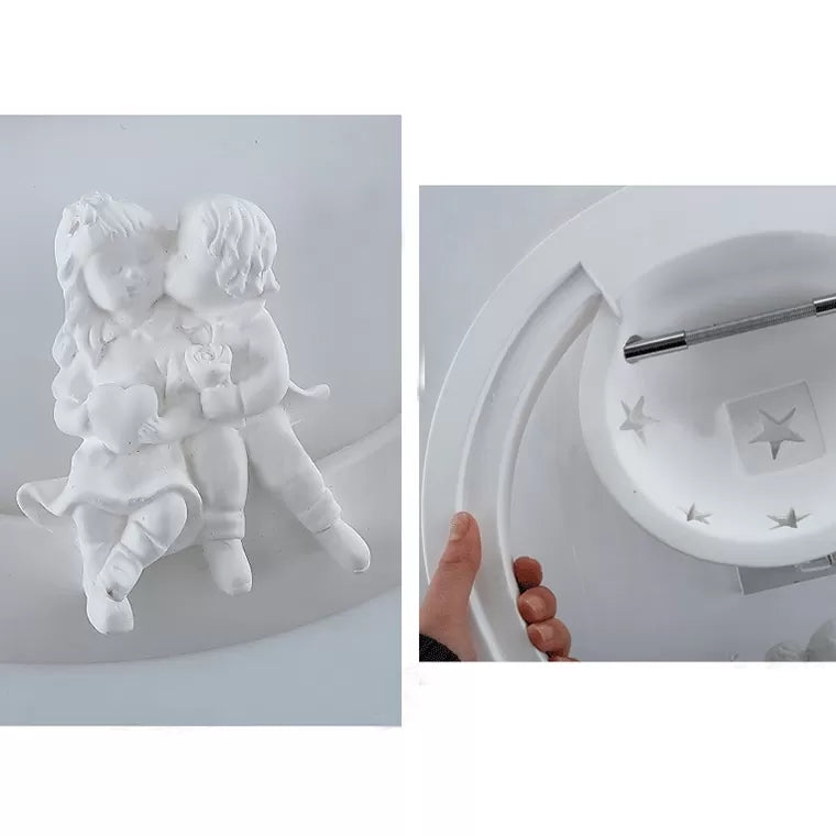 Applique murale étoilée en résine blanche avec des enfants ludiques pour une ambiance de chambre de rêve