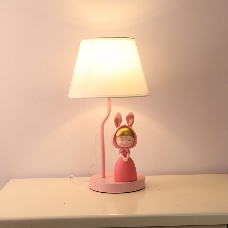 Kids' Pink Fabric Drum Table Lamp with Resin Figurine - Tapered Design for Bedroom Nightstand