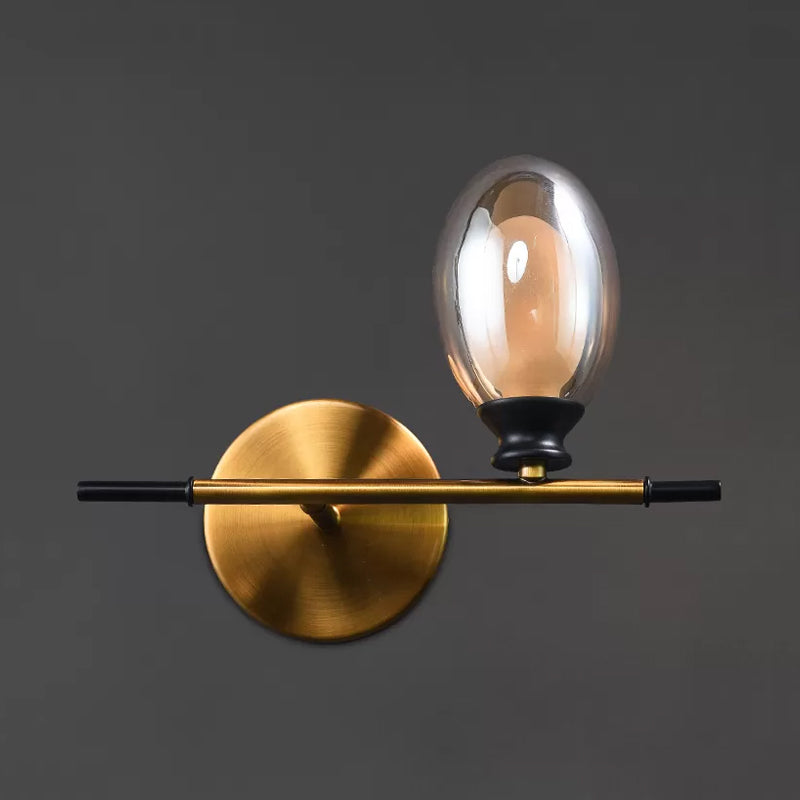 Mid Century Brass Wall Lamp with Dual Oval Clear/Amber Glass Shade