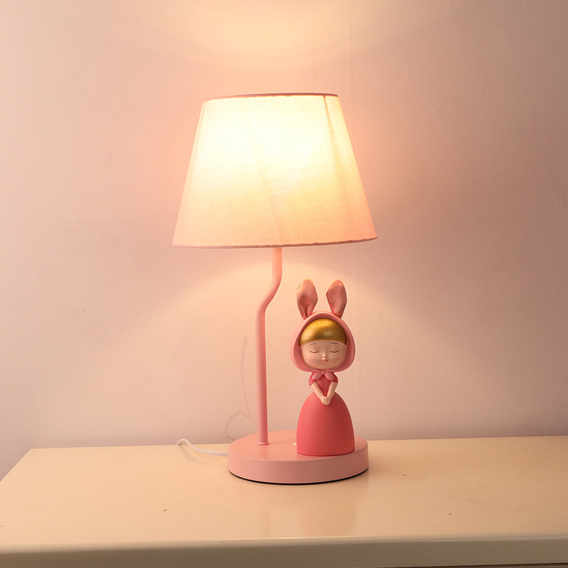 Kids' Pink Fabric Drum Table Lamp with Resin Figurine - Tapered Design for Bedroom Nightstand